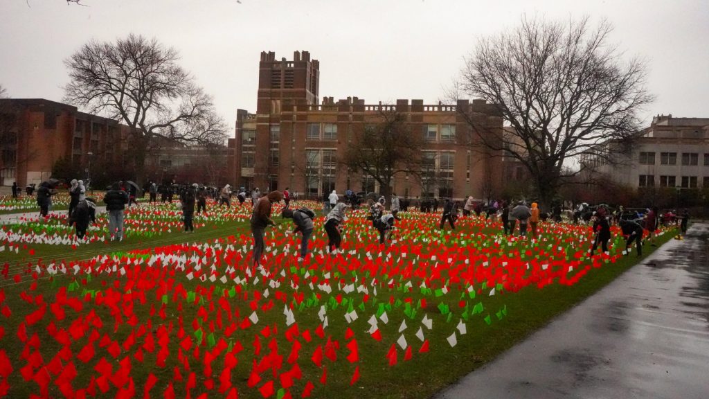 More than 100 people planted flags Sunday on Marquette University’s campus for Palestinians killed in Gaza since Oct. 7.