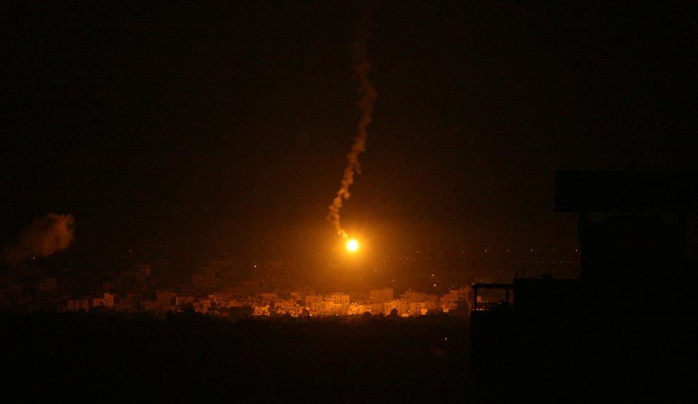 An Israeli flare lights up an area on the edge of Gaza City after a day of heavy clashes between Hamas fighters and Israeli forces on January 5, 2009. (MAHMUD HAMS/AFP/Getty Images)